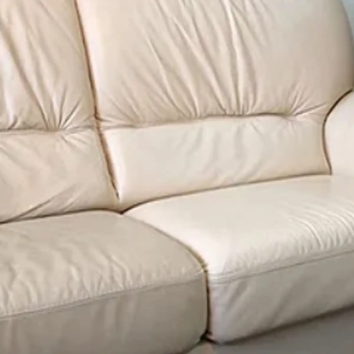Light-colored leather sofa after deep cleaning